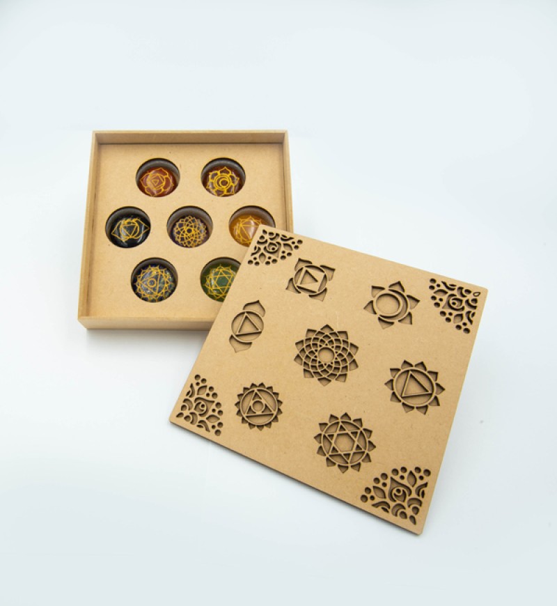 Mixed Chakra crystals engraved Chakra disc set in a Chakra symbol box